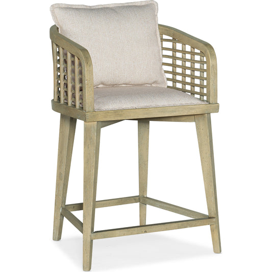 Surfrider Barrel Back Counter Stool by Hooker Furniture in beige and driftwood, zuri cream. Made from fabric, rattan, nailheads, copper sheet in a coastal style.