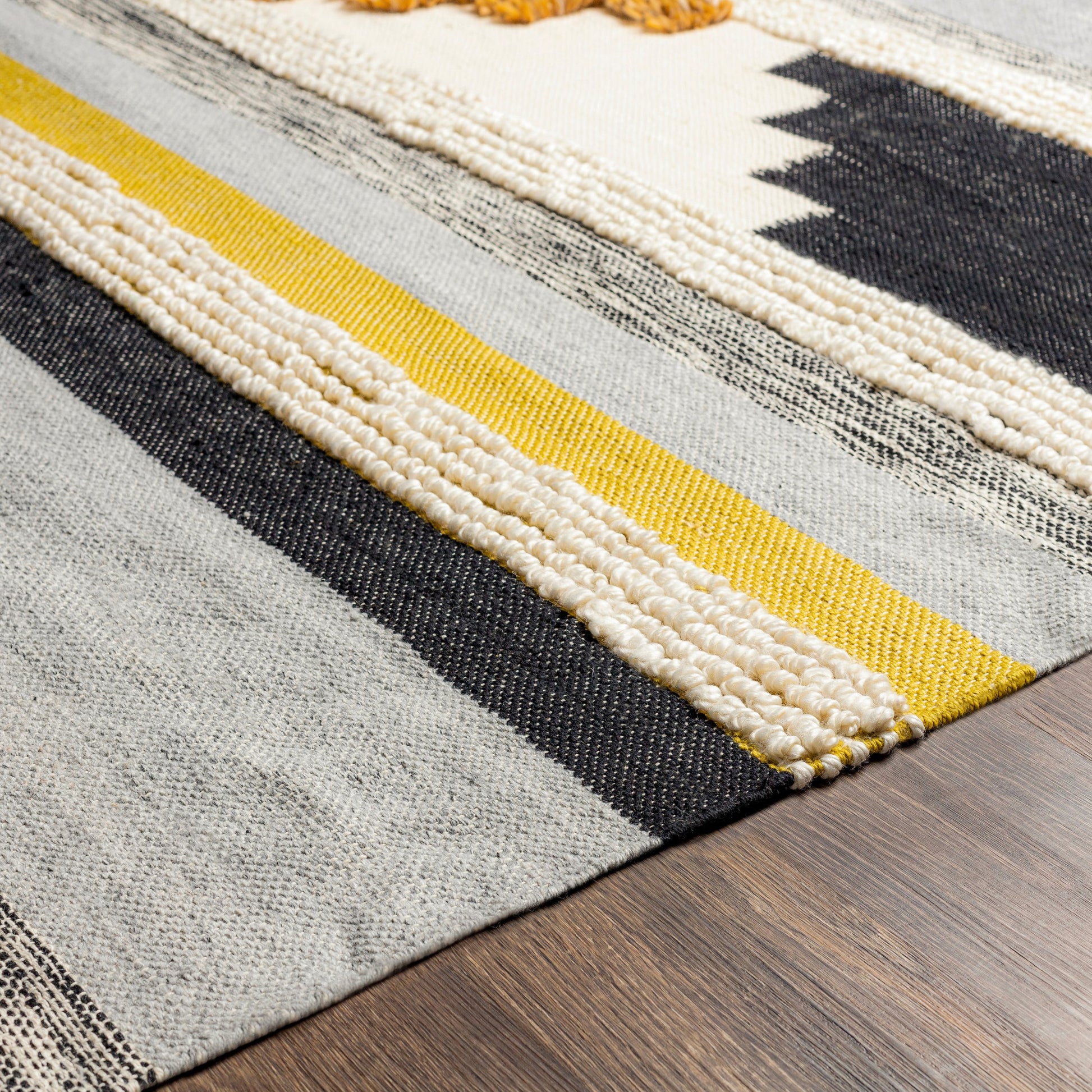 Yuva YUV-2300 Indoor/Outdoor Rug by Surya in rust, mustard, black, medium gray, cream. Made from 100% recycled pet yarn in a unique style.