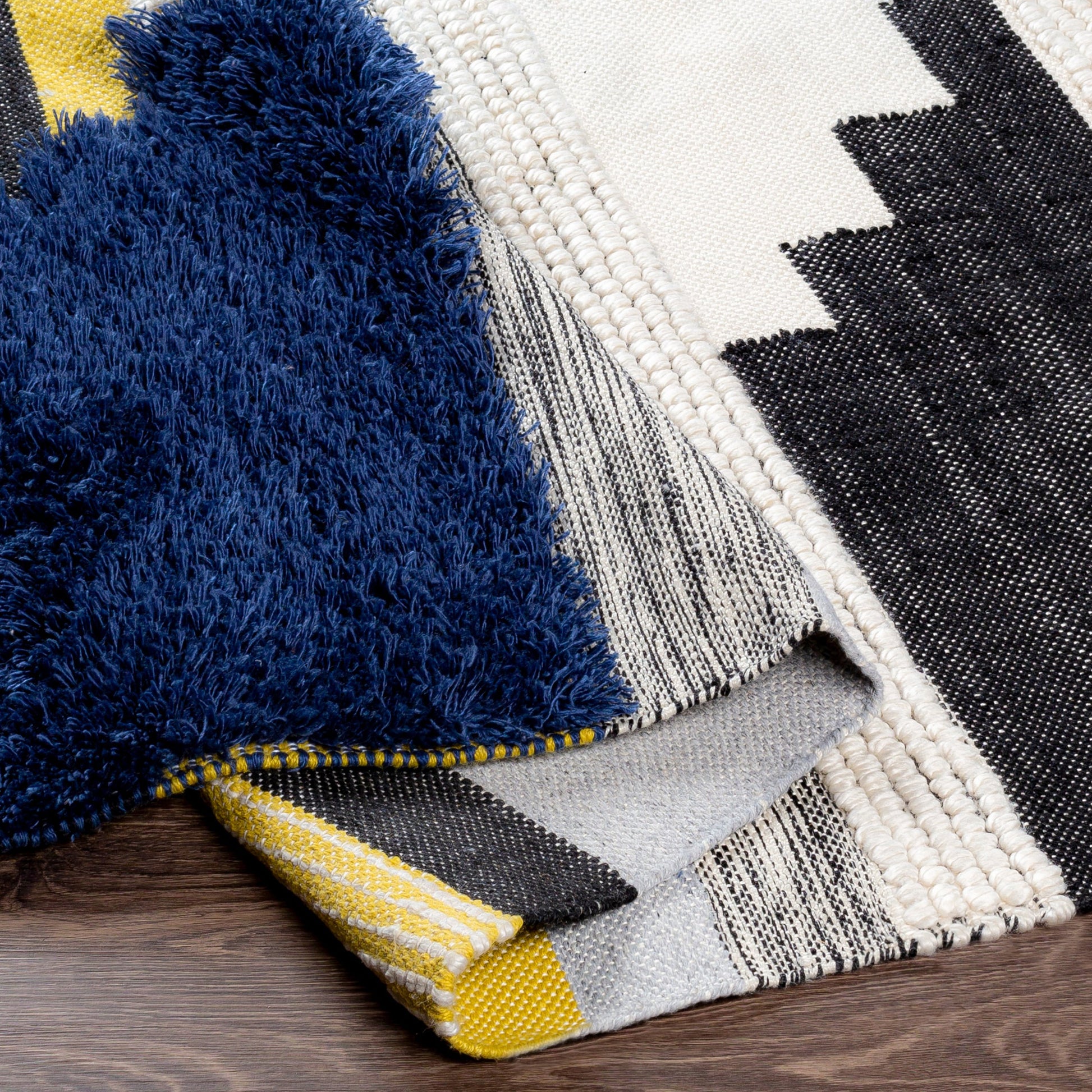 Yuva YUV-2300 Indoor/Outdoor Rug by Surya in rust, mustard, black, medium gray, cream. Made from 100% recycled pet yarn in a unique style.