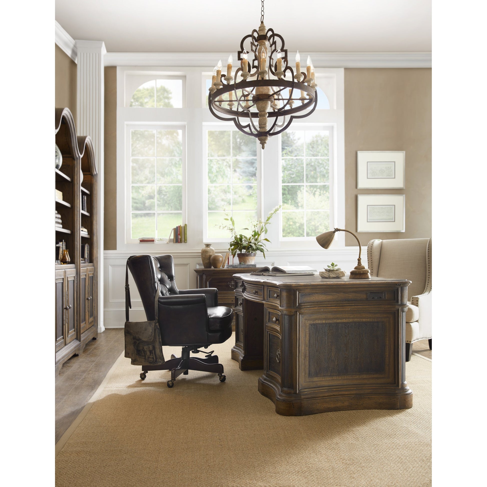 St. Hedwig Executive Desk by Hooker Furniture in saddle brown, anthracite black. Made from white oak, walnut veneers with high quality bonded leather, resin in a traditional style.