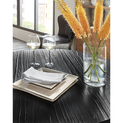 Chapman Shou Sugi Ban Petite Round Dining Table by Hooker Furniture in charred black. Made from pine veneers in a modern style.