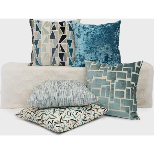 Riker Pillow by DV Kap Home in turquoise. Made from 33% viscose, 27% polyester, 27% linen, 13% acrylic in a unique style.