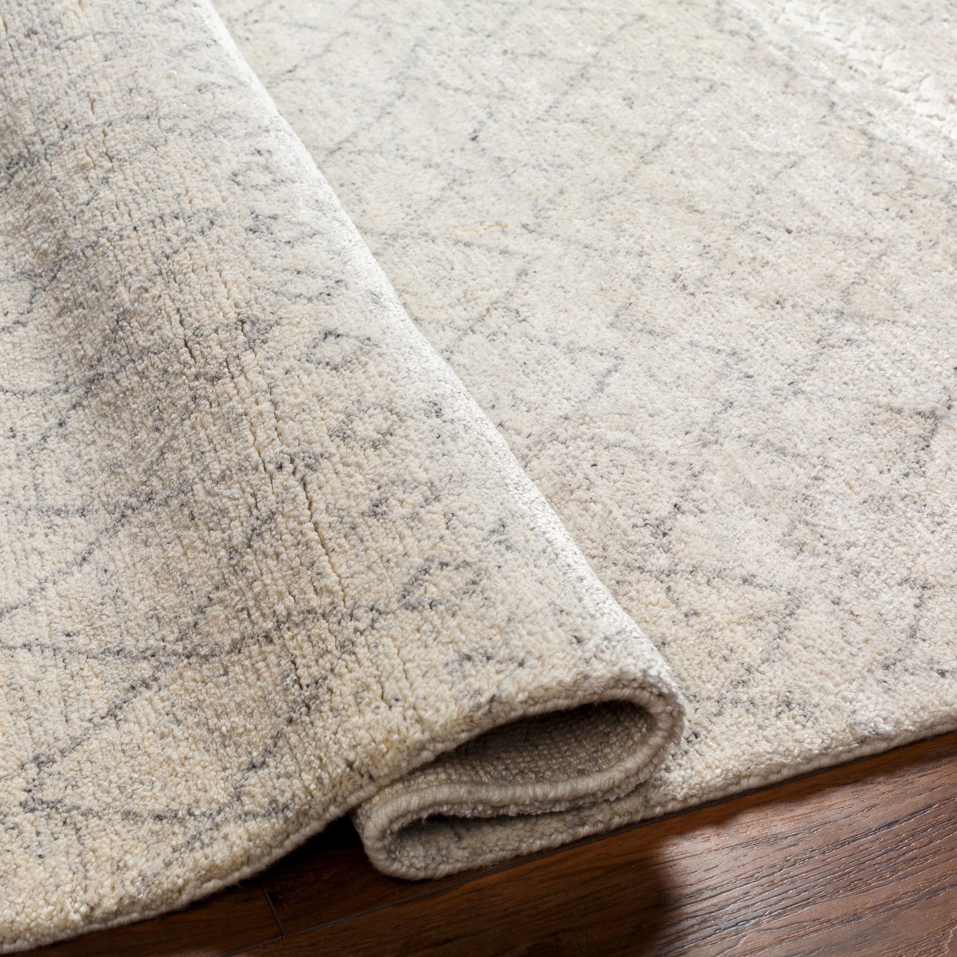 Zara ZAR-2306 Rug by Surya in light gray, gray, medium gray. Made from 70% viscose, 30% wool in a unique style.