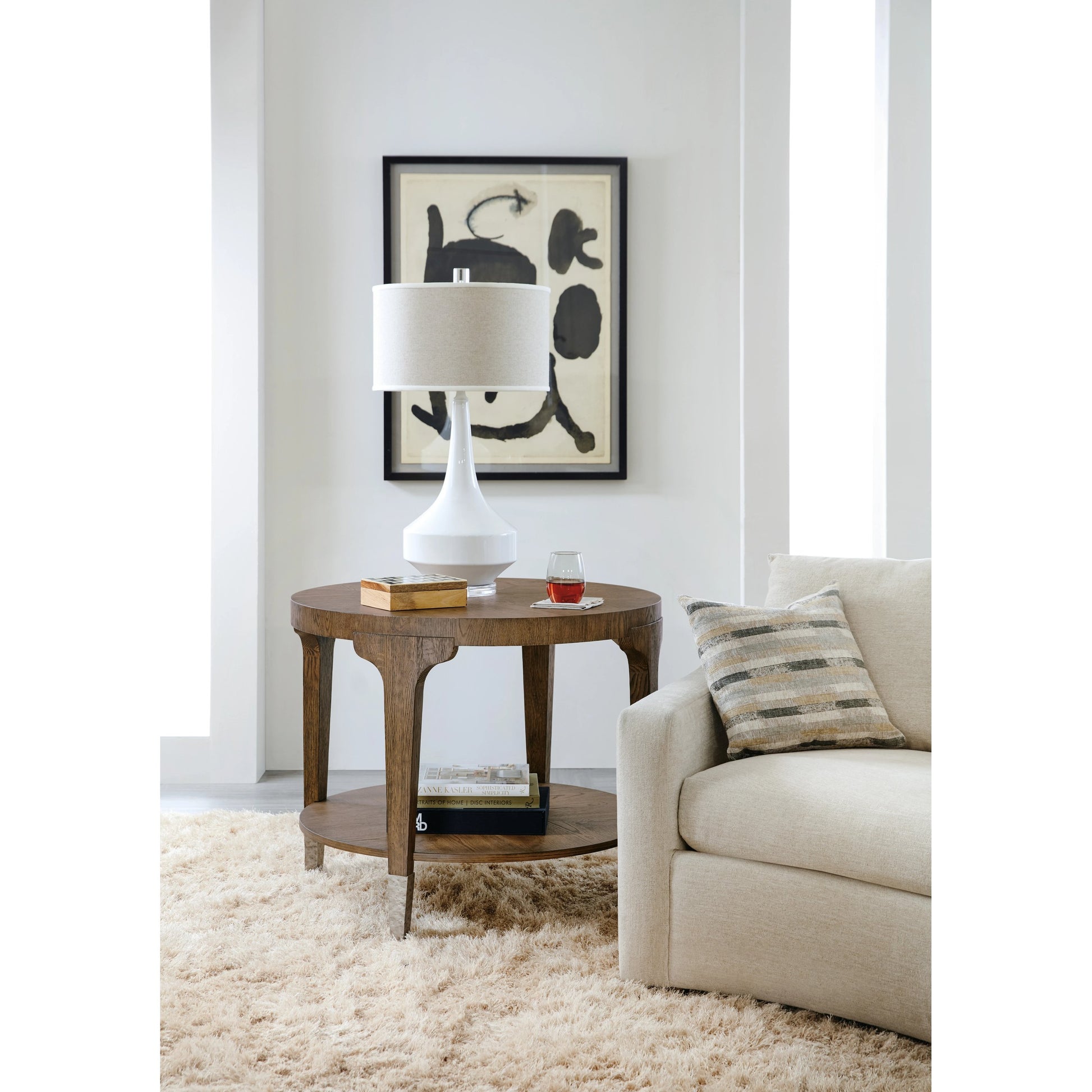 Chapman Round Side Table by Hooker Furniture in sorrel. Made from white oak veneers, metal ferrules in a transitional style.