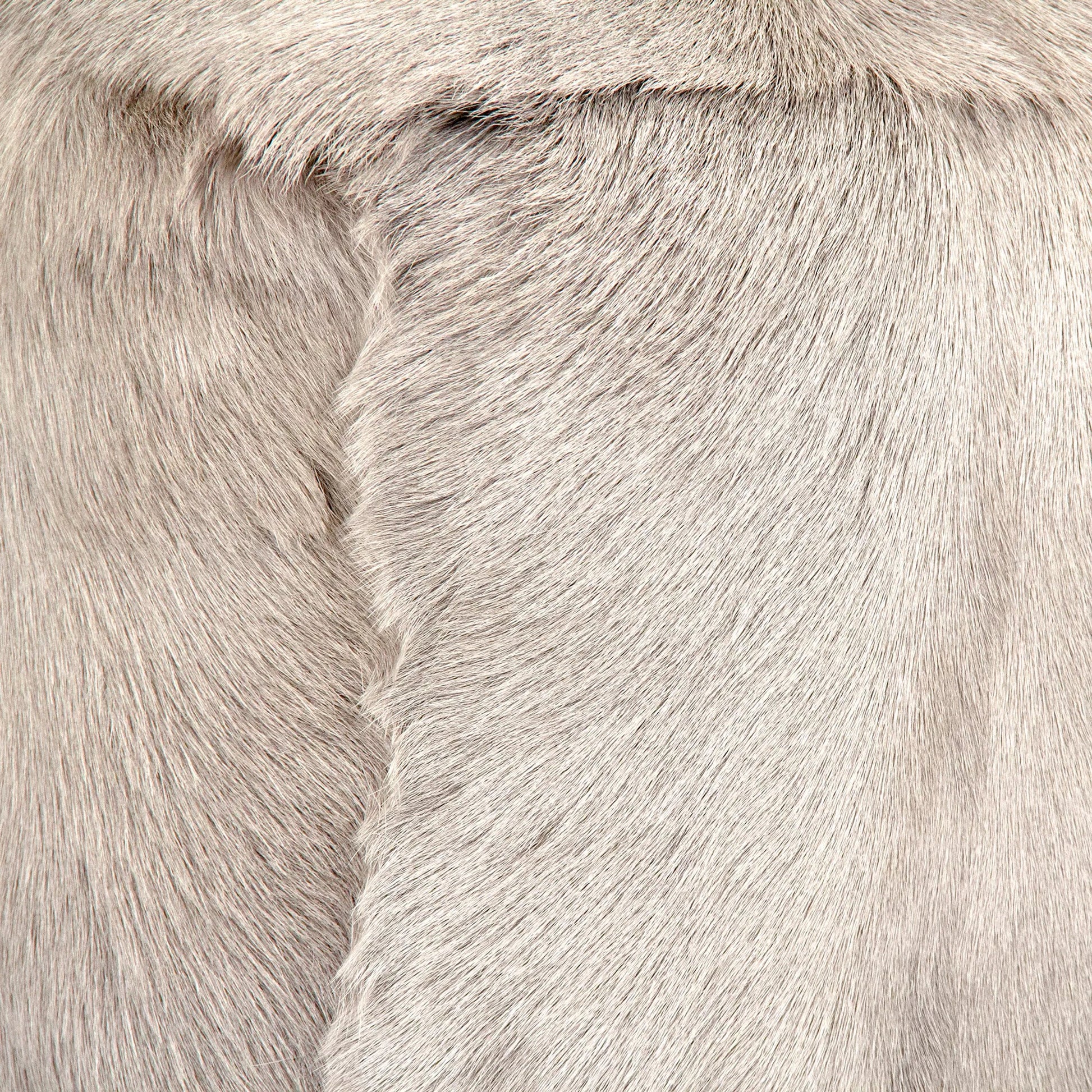Tibetan Goat Fur Pouf by Zentique. Made from polybeans in a modern style.
