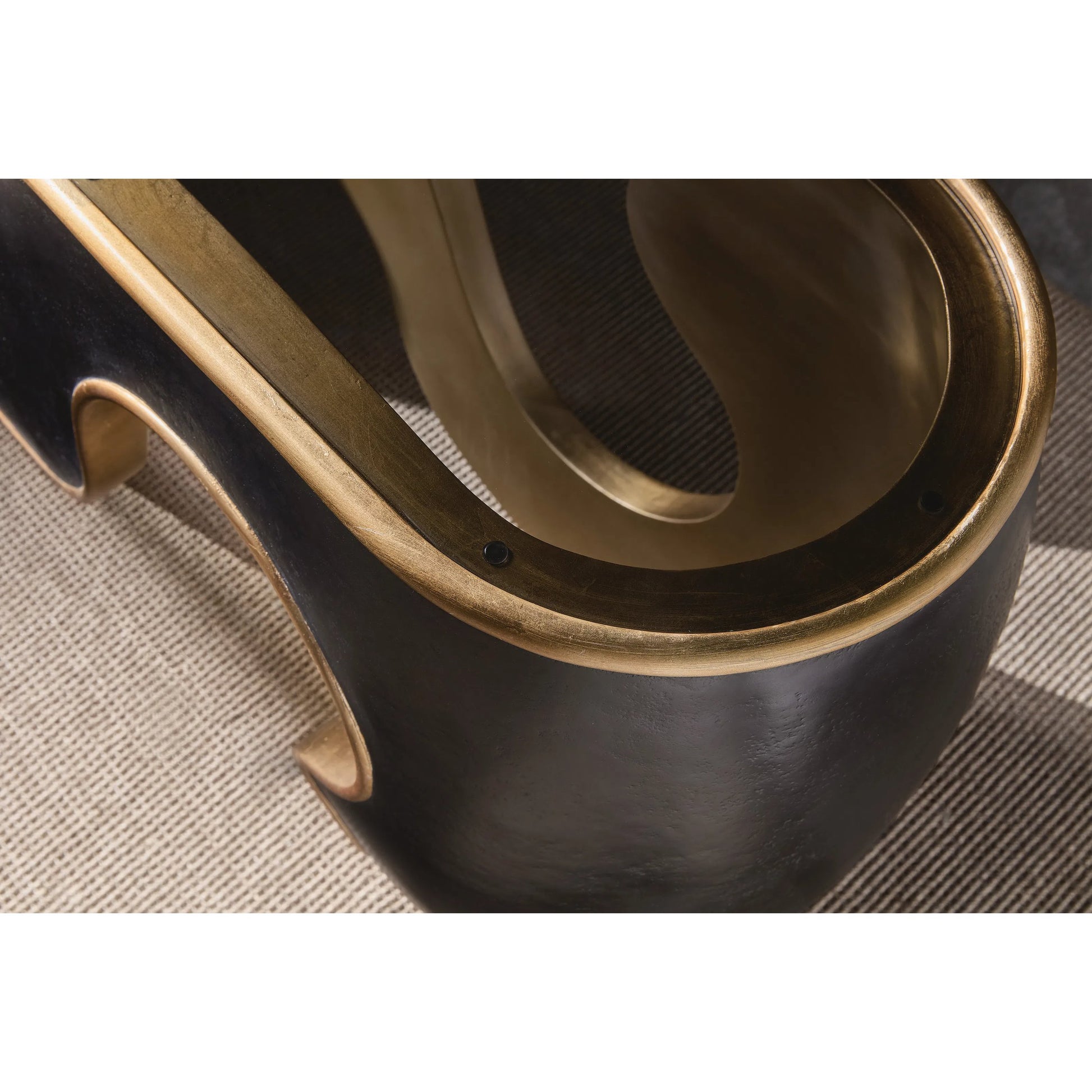 Melange Even and Flow Console Table by Hooker Furniture in black, gold accents. Made from resin, glass in a modern style.
