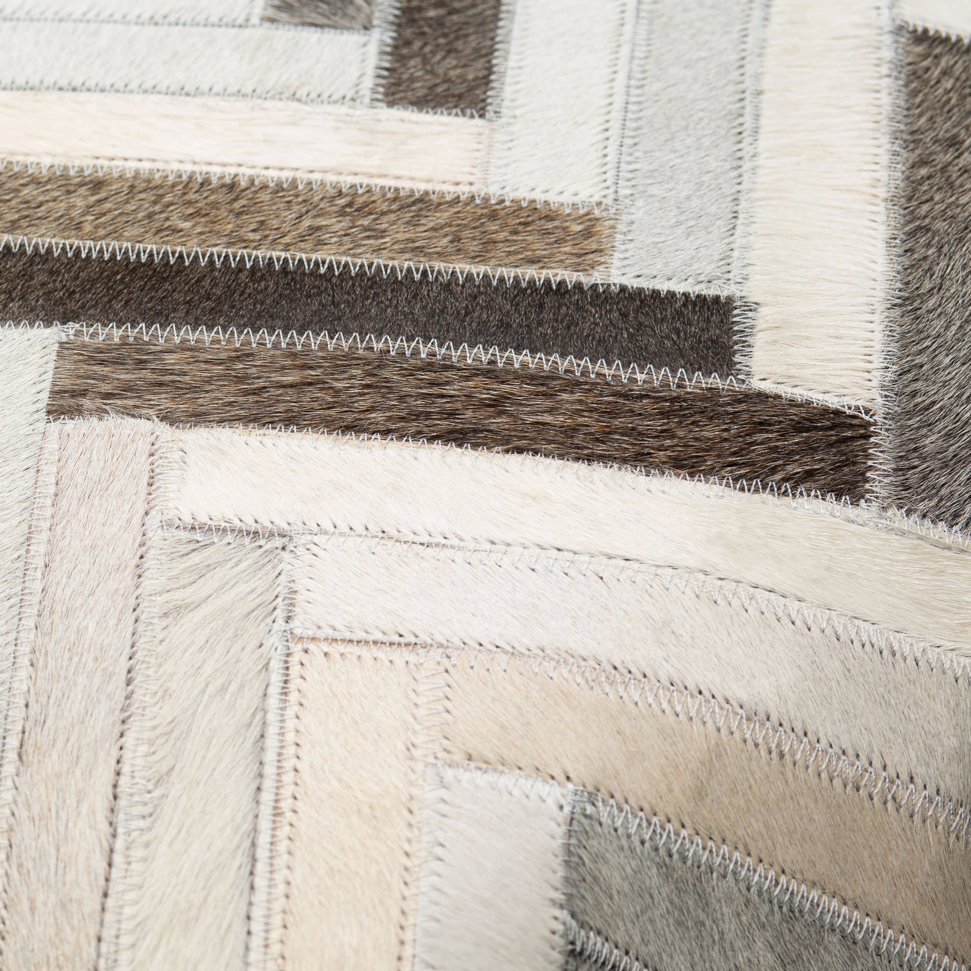 Zander - 29977 by Surya in charcoal, taupe. Made from 100% leather, 80% polyester, 20% cotton in a transitional style.