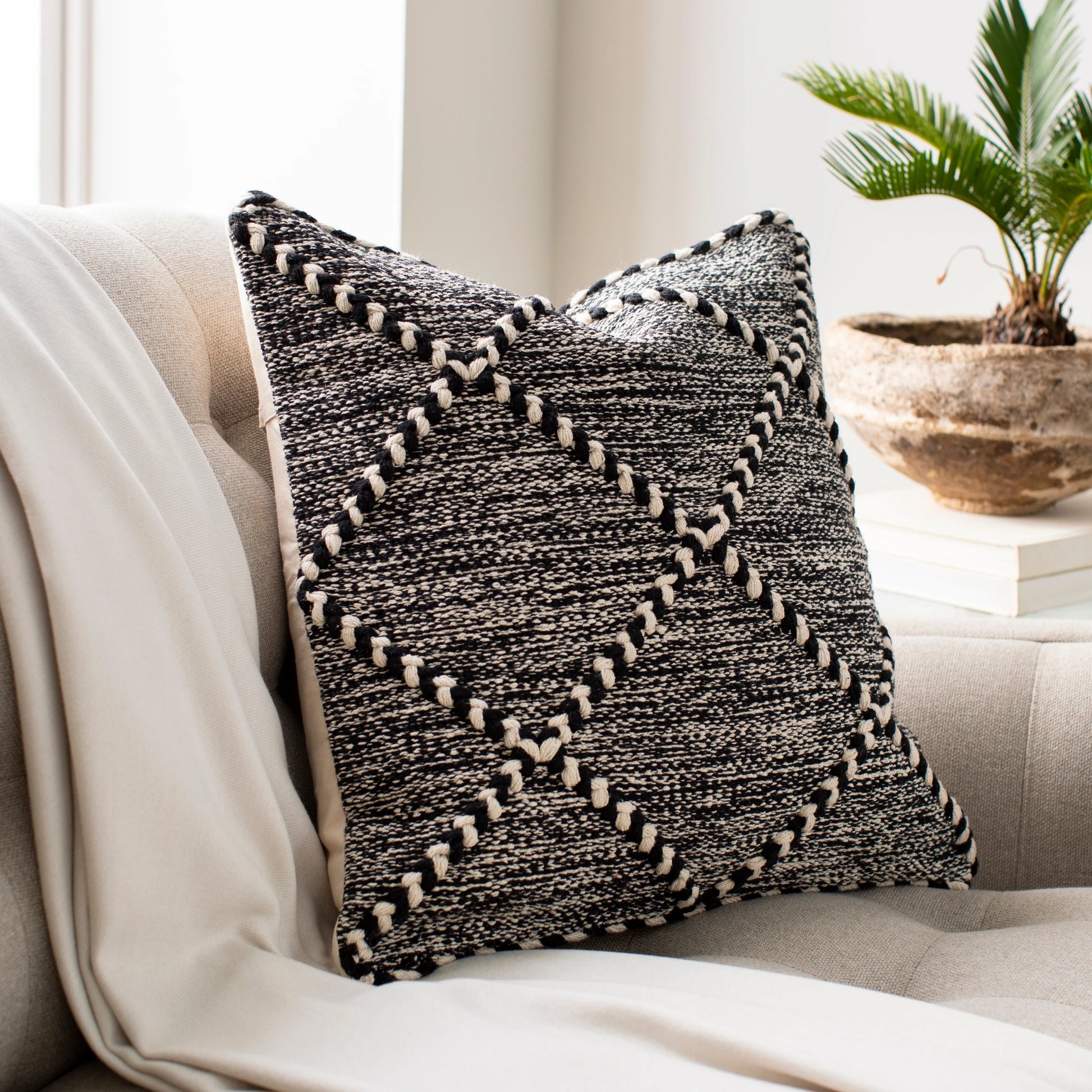 Zanafi Pillow - 9099 by Livabliss in black, wheat. Made from 100% cotton in a eclectic & global style.