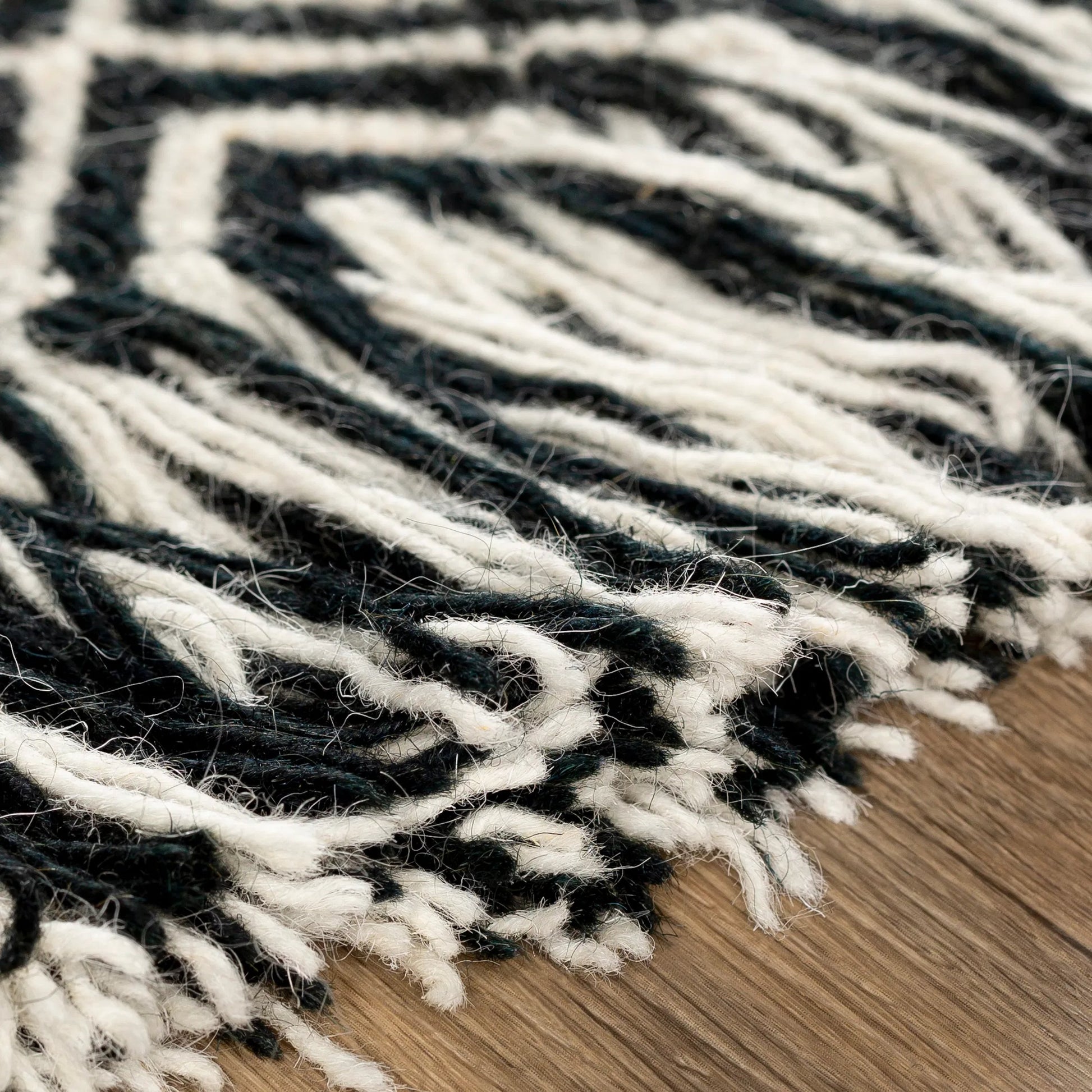 Zanafi ZNF-2303 Indoor/Outdoor Rug by Surya in black, ivory. Made from 100% wool in a unique style.