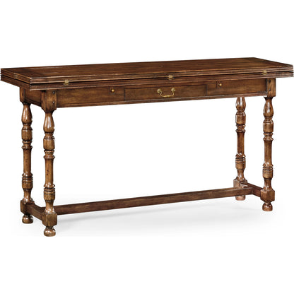 Casual Accents Small Walnut Hunt Table by Jonathan Charles in brown and medium walnut country distressed. Made from acacia in a traditional style.