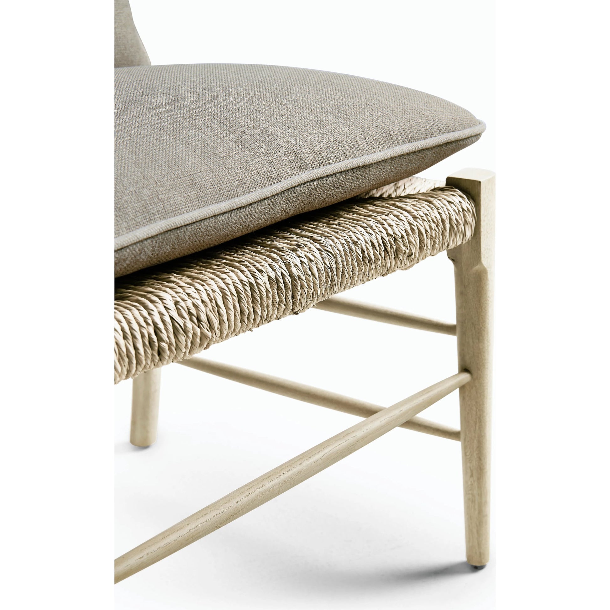 Timeless Doppler Ladderback Side Chair by Jonathan Charles in brown. Made from oak, fiber rush, foam, fabric in a coastal style.