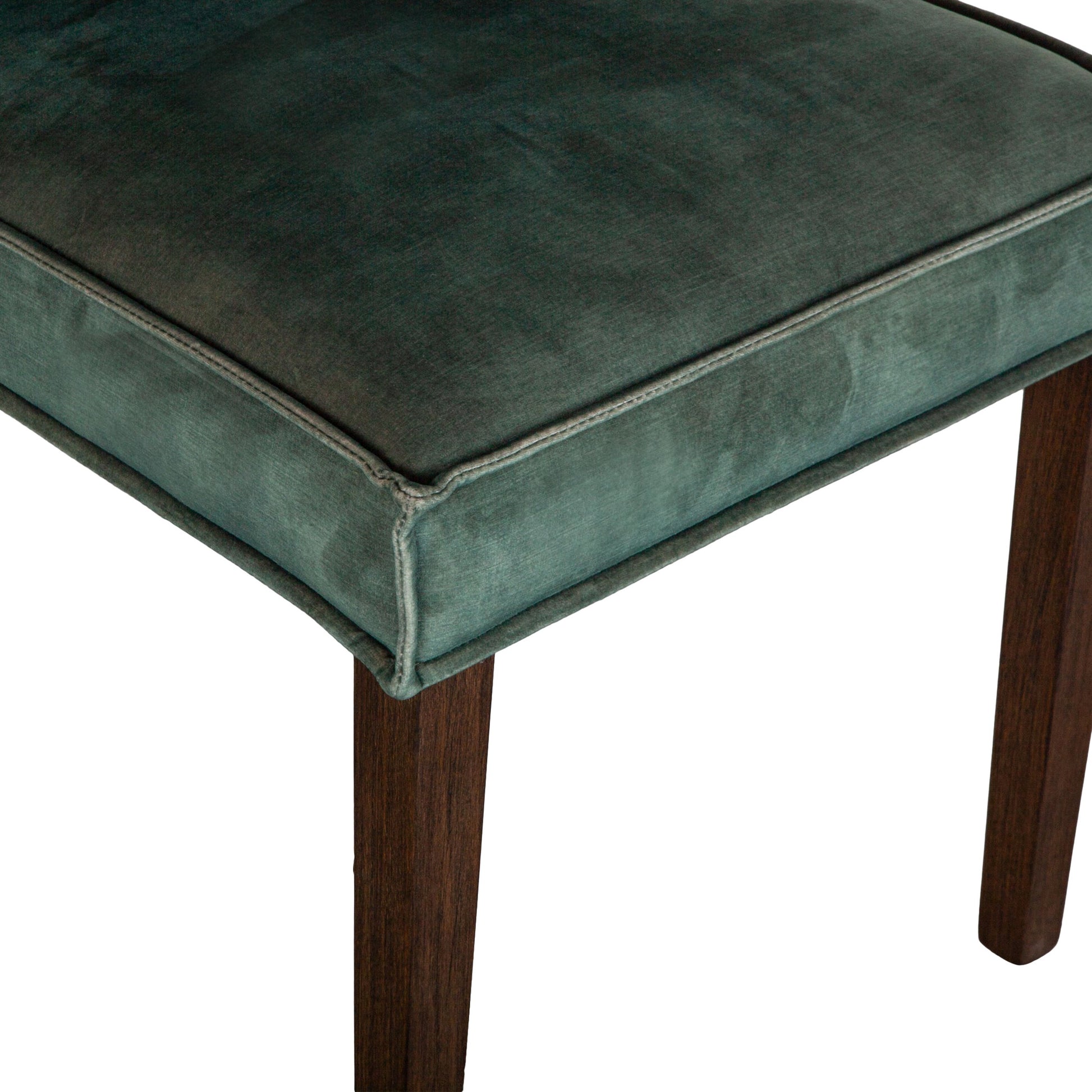 Avery Velvet Dining Chairs by World Interiors in dark green and brown. Made from wood, velvet in a modern style.