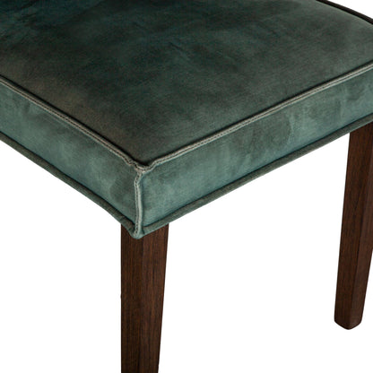Avery Velvet Dining Chairs by World Interiors in dark green and brown. Made from wood, velvet in a modern style.