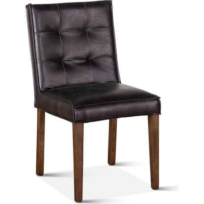 Avery Leather Dining Chairs by World Interiors. Made from wood, bi-cast leather in a modern style.