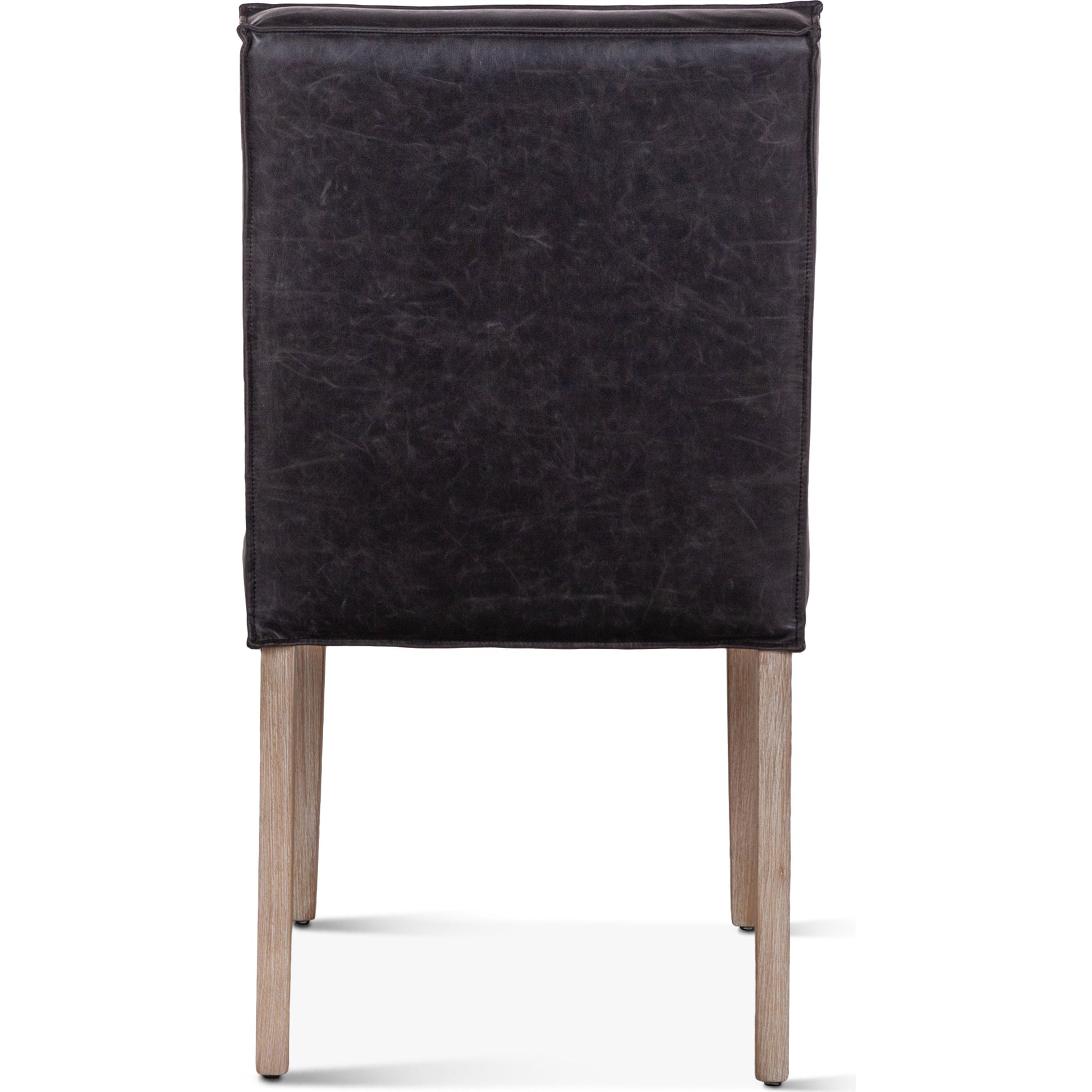 Avery Leather Dining Chairs by World Interiors. Made from wood, bi-cast leather in a modern style.