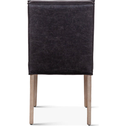 Avery Leather Dining Chairs by World Interiors. Made from wood, bi-cast leather in a modern style.