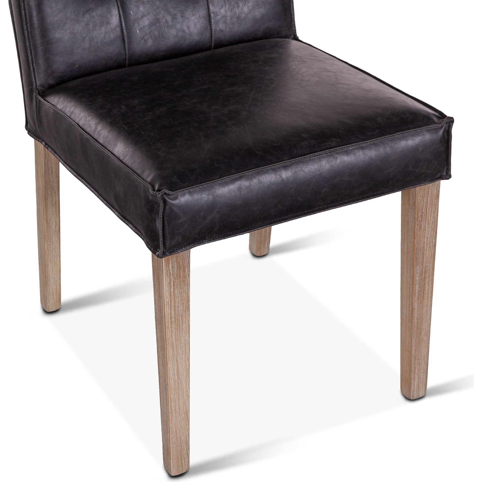 Avery Leather Dining Chairs by World Interiors. Made from wood, bi-cast leather in a modern style.