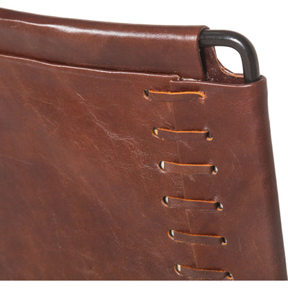 Melbourne Dining Armchair by World Interiors in dark brown and black. Made from reclaimed iron, leather in a modern style.