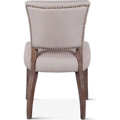 Portia Side Chairs by World Interiors in asphalt, whitewash and whitewash. Made from oak wood, velvet in a transitional style.