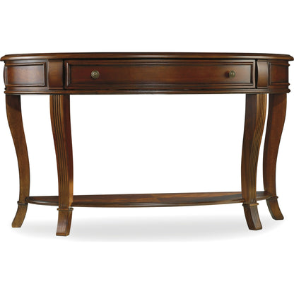 Brookhaven Console Table by Hooker Furniture in cherry. Made from cherry veneers in a traditional style.